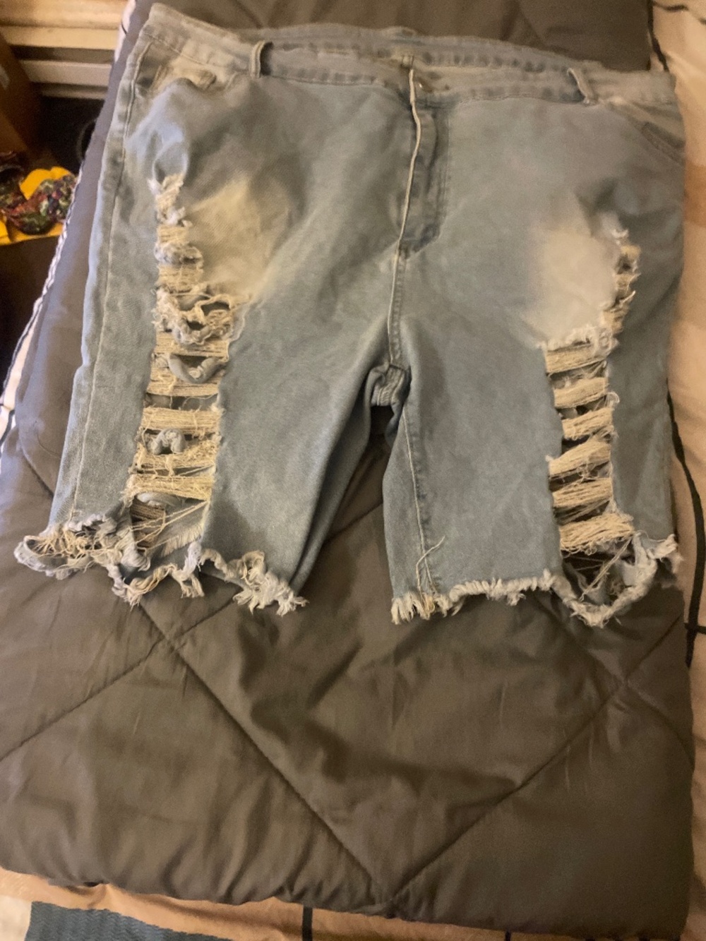Distressed denim shorts